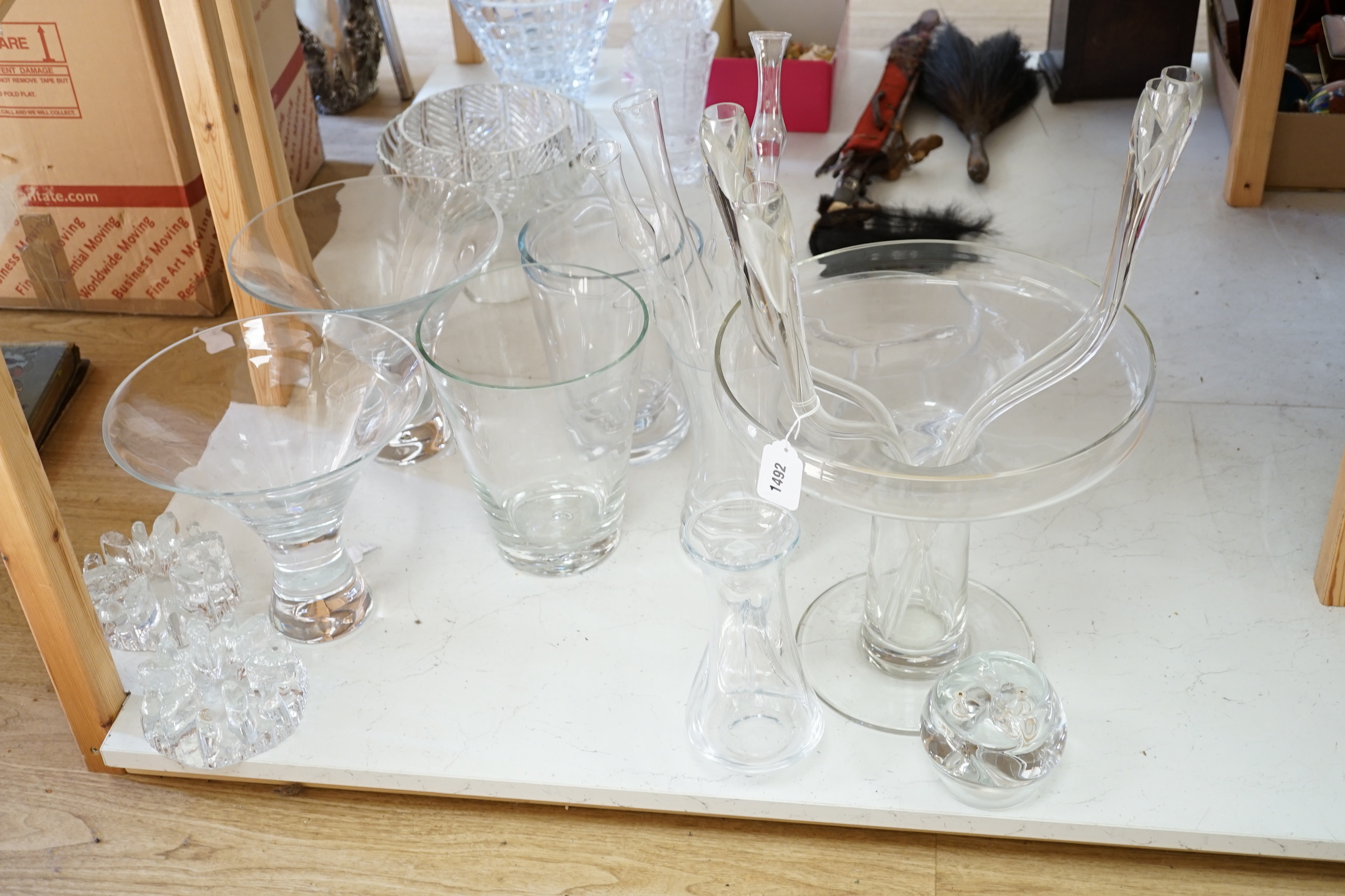 A collection of mostly clear glass vases, tallest 36cm high